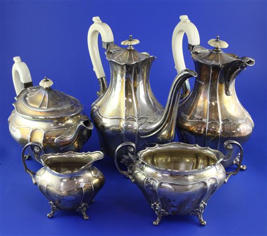 A late Victorian and Edwardian silver five piece tea and coffee service by James Dixon & Sons, gross 78 oz.